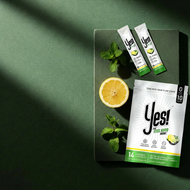 YES! Lemon Lime saffron mood drink stick packs — dark green packaging, cortisol reset